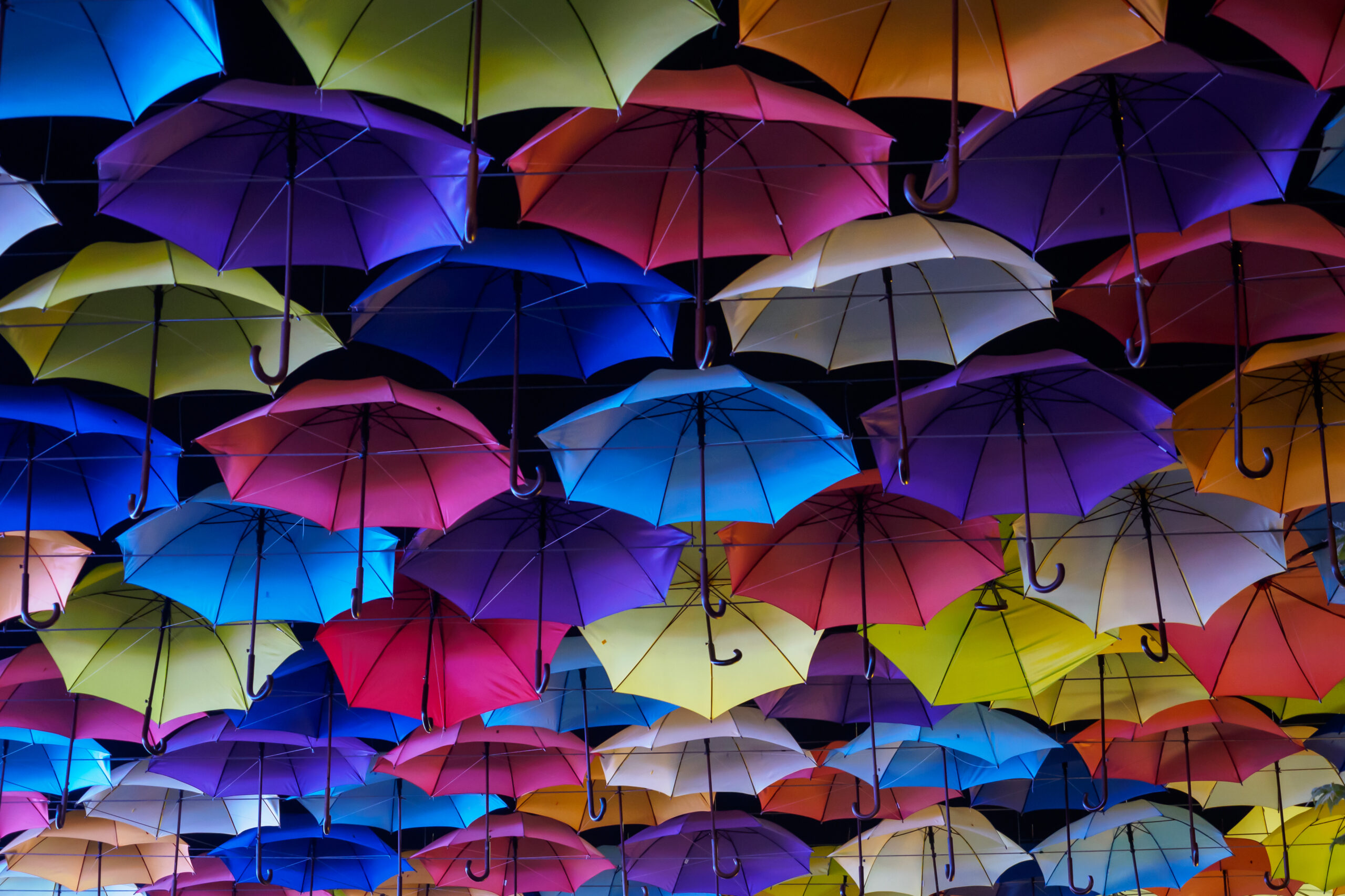 Colors umbrella with night sky background decorate in city Odessa, Ukraine